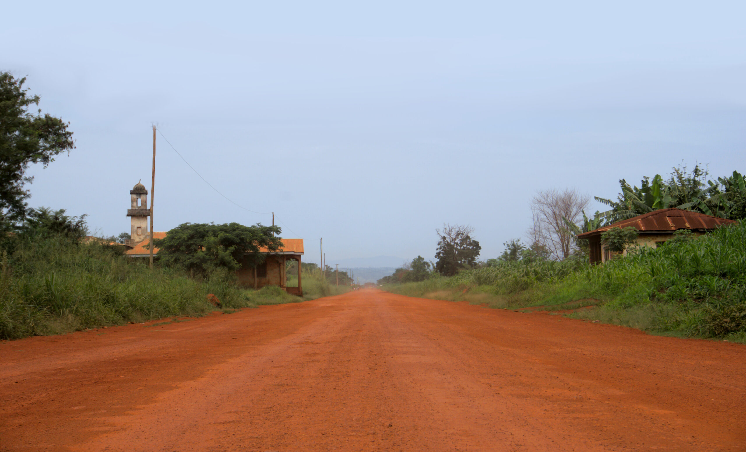 Main road in the Noun, Cameroon. It was surronded by coffee fields until the 70s. 